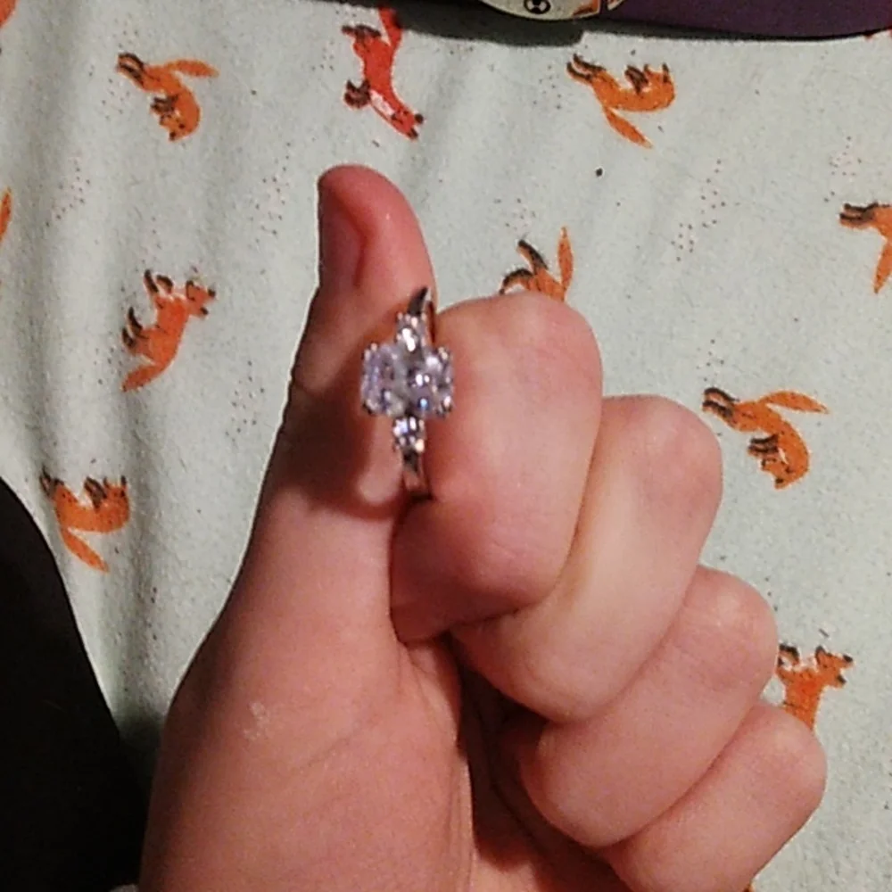 2 cubic zirconia rings both included